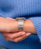 A close-up shot of a person's wrist wearing a silver Casio watch. Voir les images du produit