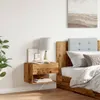 A bedroom scene with a wooden nightstand next to a bed. Náhled obrázku produktu