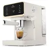 A close-up shot of a cream-colored espresso machine brewing coffee into a glass cup. Voir les images du produit