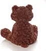 A brown teddy bear is shown from the back, sitting on a white surface. Anteprima dell’immagine prodotto