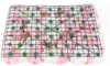 The back of a floral wall panel with pink and white artificial flowers attached to a green grid. Podgląd zdjęcia produktu