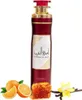 A Lattafa Ameerat Al Arab Room Spray bottle is shown with decorative elements of oranges, honeycomb, vanilla, and vanilla beans. Produktbild-Vorschau