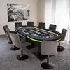 A poker table with chairs in a room. Náhled obrázku produktu