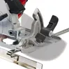 A close-up view of a power tool's cutting guide and adjustment mechanisms. Produktbild-Vorschau