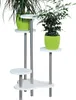 A white plant stand with two green potted plants on it, set against a white background. Anteprima dell’immagine prodotto