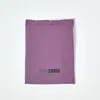 A flat lay of a folded purple bed sheet on a white background. Produktbild-Vorschau