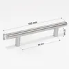 A single brushed stainless steel cabinet handle with dimensions indicated by overlay graphics. Náhled obrázku produktu