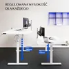 Two white height-adjustable desks with monitors and a laptop. Podgląd zdjęcia produktu