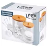The image shows the packaging of a bathroom container set, featuring two clear jars with wooden lids, designed to hold cotton swabs and pads. Anteprima dell’immagine prodotto