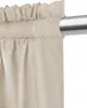 Close-up of a beige curtain hanging from a silver rod. Náhled obrázku produktu