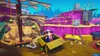 A cartoon character in a pirate hat is sitting in a cardboard box on a wooden ship deck. The background features a colorful, alien-like landscape with purple cliffs and strange structures. Produktbild-Vorschau