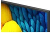A close-up view of a television screen displaying a colorful abstract image. Voir les images du produit