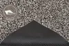 A close-up view of a rug, showing the texture of the fibers and the underside of the rug. Anteprima dell’immagine prodotto