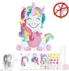 A collage of images showing a unicorn craft kit, including the finished product, components, and instructions. Produktbild-Vorschau
