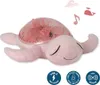 A pink plush turtle night light with a rose gold shell, lying on a white background. Decorative waves and musical notes are shown above the turtle. Podgląd zdjęcia produktu