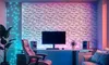 A modern home office or gaming setup with a desk, computer, chair, and decorative wall panels. Produktbild-Vorschau