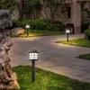Garden path with solar lights illuminating the walkway and surrounding grass. Anteprima dell’immagine prodotto