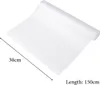 A roll of white textured shelf liner with measurements indicated. Produktbild-Vorschau