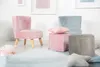 A children's playroom with several small upholstered seats and cushions. Produktbild-Vorschau