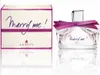 A perfume box and bottle are displayed side-by-side on a white background. Podgląd zdjęcia produktu