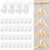 A split image showing a collection of white plastic hanger hooks on the left and a close-up of them in use on the right, organizing clothes on hangers. Produktbild-Vorschau