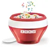 A red and white ice cream maker with ice cream and sprinkles. Náhľad obrázku produktu