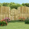 A garden scene with a wooden fence and gate, surrounded by green grass and colorful flowers. Anteprima dell’immagine prodotto