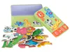 A puzzle tin with scattered puzzle pieces in front of it. Náhled obrázku produktu