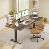 A modern home office setup with an adjustable height desk. Voir les images du produit