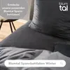 A close-up view of dark gray bedding, likely a duvet cover and fitted sheet, with text overlays and a brand logo. Náhled obrázku produktu