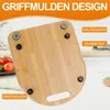 The underside of a bamboo cutting board with rubber feet and Teflon sliders, with text overlays highlighting its features. Voir les images du produit