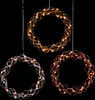 Three LED decorative wreaths are displayed against a black background. Produktbild-Vorschau