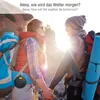Two hikers holding hands in a natural outdoor setting with backpacks. Produktbild-Vorschau