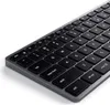 A close-up, angled view of a gray and black wireless keyboard. Produktbild-Vorschau