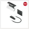 A product shot of a door opener kick pedal and its accessories against a white background. Produktbild-Vorschau