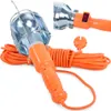 A hanging garage light with an orange handle and cord, coiled next to it. Náhľad obrázku produktu