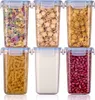 Six clear plastic food storage containers with blue lids, filled with different food items, arranged in two rows of three. Produktbild-Vorschau