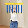 A baby is playing with a hanging toy. Náhled obrázku produktu