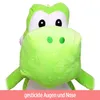 A close-up of a large, green plush toy dinosaur, likely Yoshi from Super Mario, against a white background. The bottom of the image has a pink overlay with German text. Produktbild-Vorschau