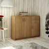 A wooden cabinet with drawers and doors in a room with wooden walls and flooring. Produktbild-Vorschau