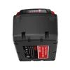 A top-down view of a black power tool battery with red accents and indicator lights. Produktbild-Vorschau