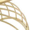 A close-up view of the golden metal frame of a table. Anteprima dell’immagine prodotto