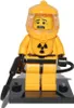 A LEGO minifigure in a yellow hazmat suit with a radiation symbol on its chest, holding a black tool. Náhled obrázku produktu