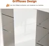 Close-up view of a white high-gloss cabinet with glass shelves and LED lighting. Podgląd zdjęcia produktu