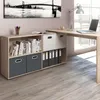 A corner desk setup in a home office with a bookshelf and storage units. Náhled obrázku produktu
