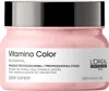 A pink jar of L'Oréal hair mask with a black lid, set against a white background. Produktbild-Vorschau