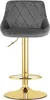 A bar stool with a gray velvet seat and a gold base. Voir les images du produit