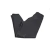 A pair of black leggings folded and lying on a white background. Produktbild-Vorschau