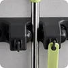 KRUMAD Supporto da parete per scope, 3 ripiani e 4 ganci Anteprima dell’immagine prodotto 8