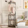 A bedroom scene with a clothing rack and storage shelves. Náhled obrázku produktu